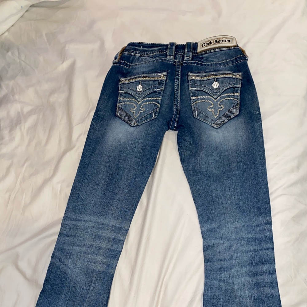 Boot cut mid rise rock revival jeans
